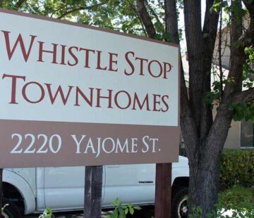 whistle stop townhomes sign photo